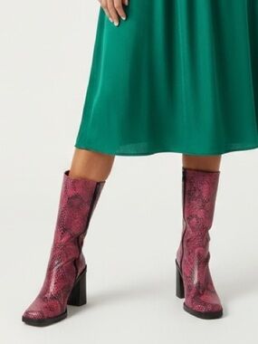 Bright pink snake skin boots